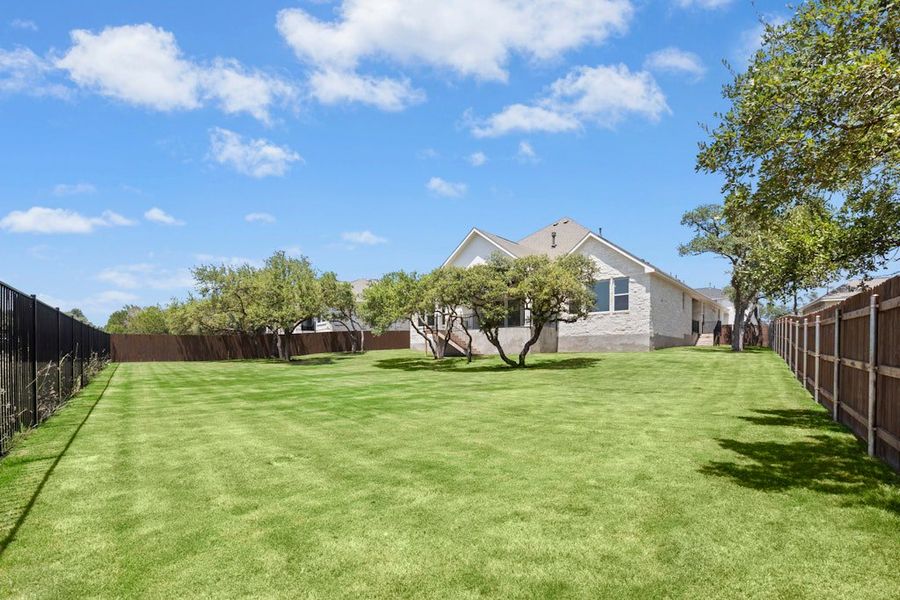 Exterior details and patio area of a home in Riverstone, Georgetown (Image 23).