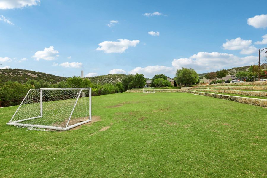 Green space provides an ideal setting for sports activities with tiered stone seating for spectators. Green space provides an ideal setting for sports activities with tiered stone seating for spectators.