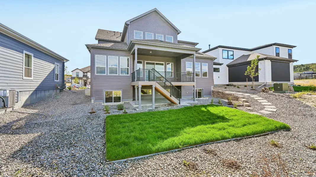 Thoughtfully designed rear exterior extends the home's appeal