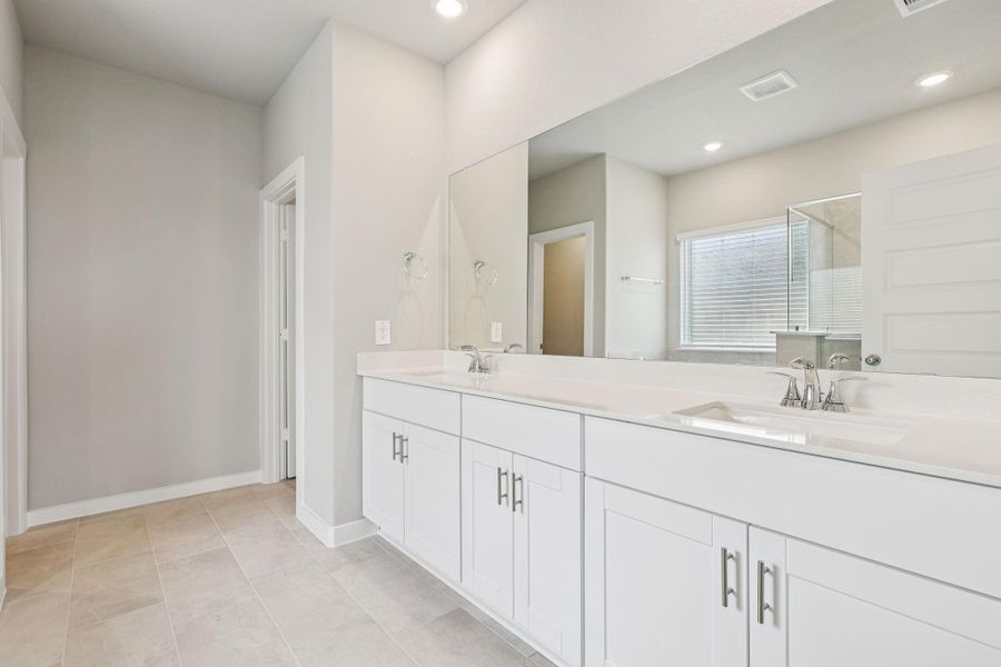 Furnished interior view inside a new home in Massey Oaks - Premier Series, Pearland (Image 6). Furnished interior view inside a new home in Massey Oaks - Premier Series, Pearland (Image 6).