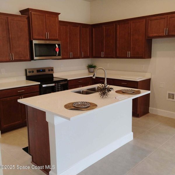Furnished interior view inside a new home in St. John Preserve, Palm Bay (Image 6). Furnished interior view inside a new home in St. John Preserve, Palm Bay (Image 6).
