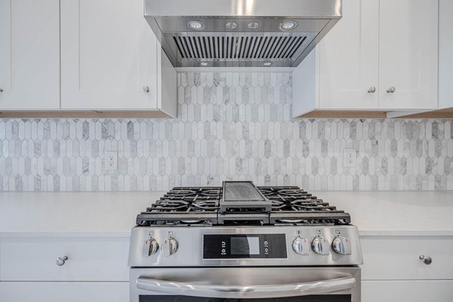 Close-up of interior finishes inside a home in Sunterra, Katy (Image 20).