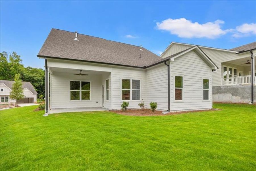 Front exterior of a new home in Cooks Farm, Woodstock, GA, highlighting curb appeal (Image 32).