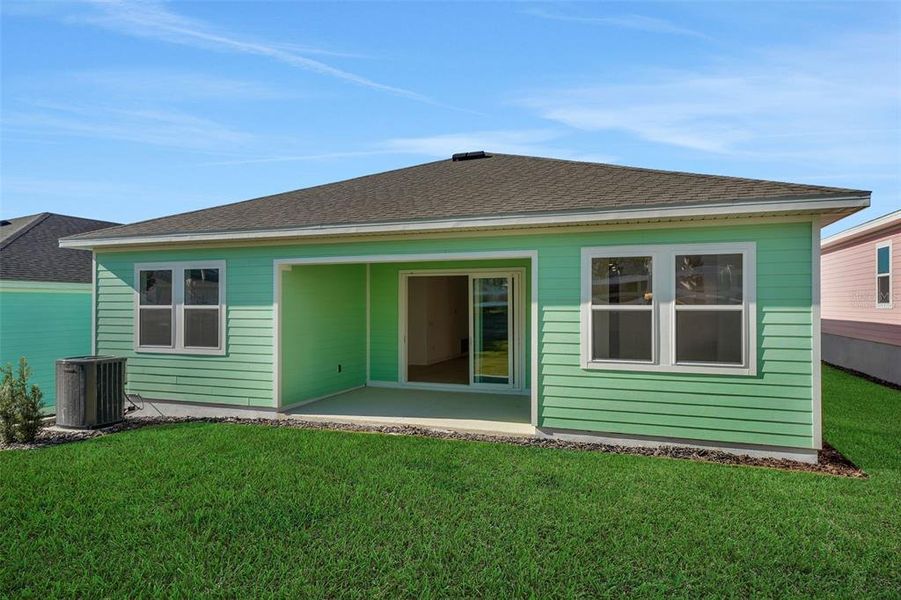 Exterior details and patio area of a home in Green Key Village, Lady Lake (Image 21).