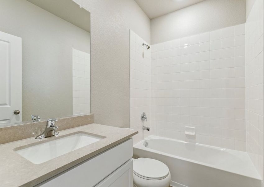 The secondary bathroom has a tub/shower combo.