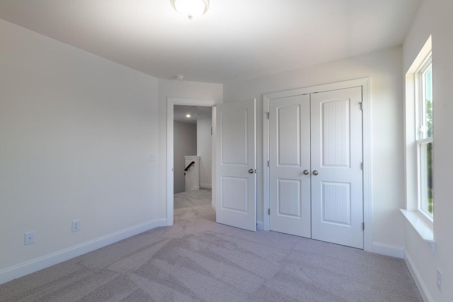 Spacious, unfurnished interior of a new home in Enclave at Traditions Townhomes, Wake Forest (Image 17).