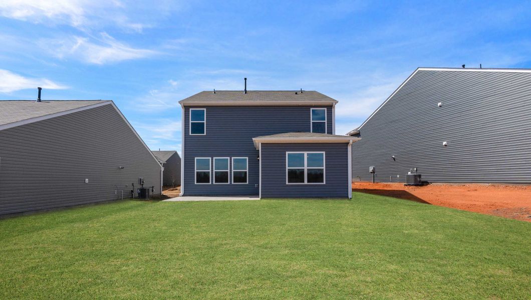 Front exterior of a new home in Stone Creek, Clinton, SC, highlighting curb appeal (Image 2).