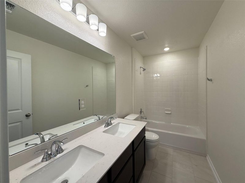 Furnished interior view inside a new home in River Bluff, Leander (Image 5). Furnished interior view inside a new home in River Bluff, Leander (Image 5).