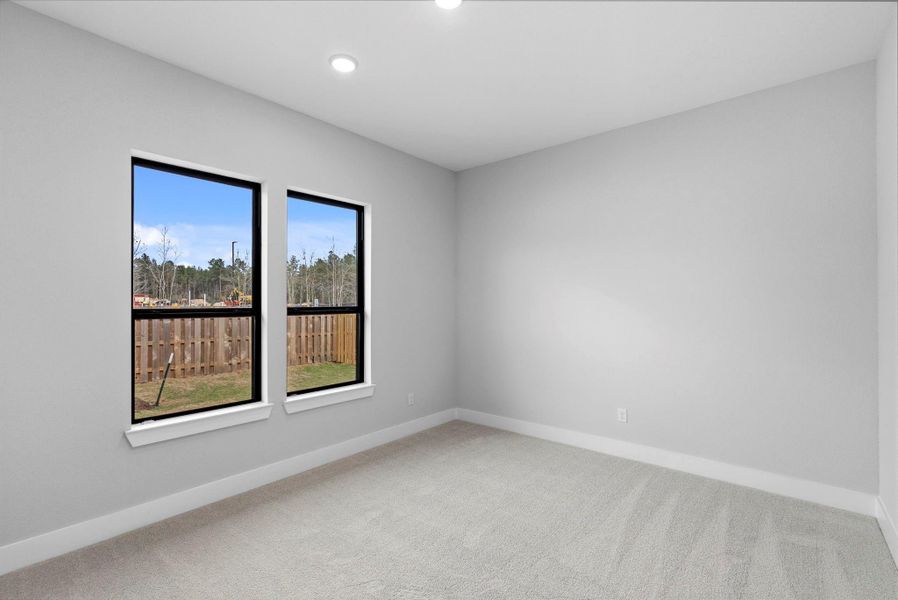 secondary bedroom on first floor with ensuite bathroom