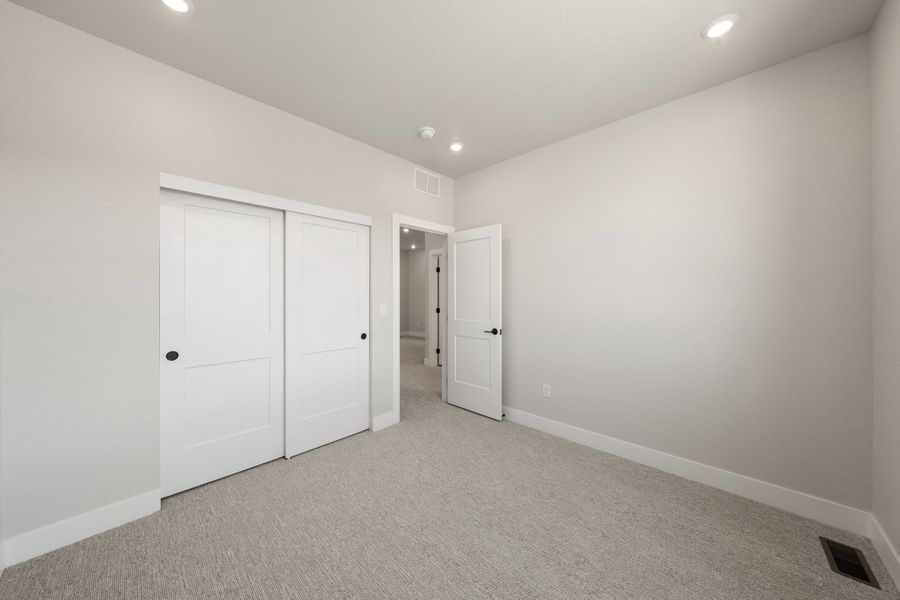 Spacious, unfurnished interior of a new home in Trumark Homes at Sterling Ranch, Littleton (Image 15).