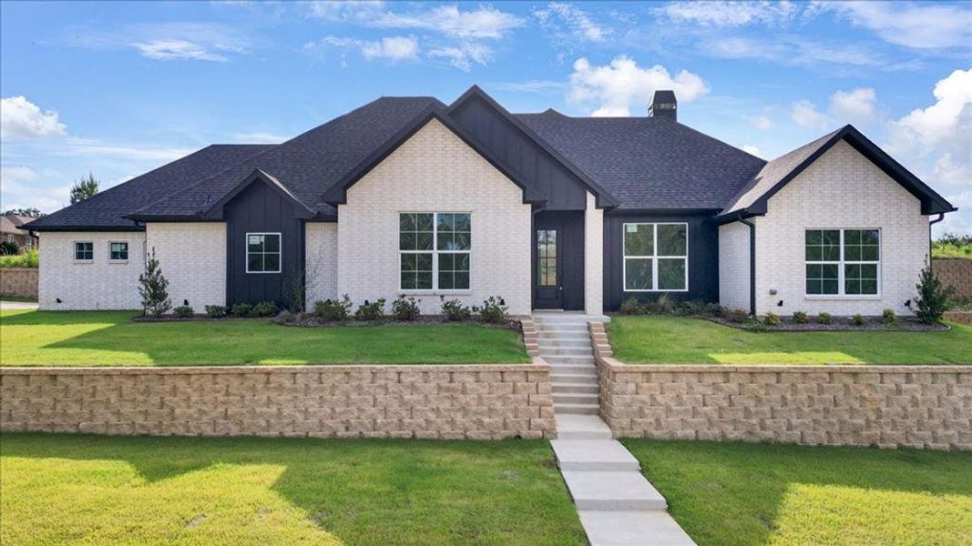 Front exterior of a new home in , Lindale, TX, highlighting curb appeal (Image 2). Front exterior of a new home in , Lindale, TX, highlighting curb appeal (Image 2).
