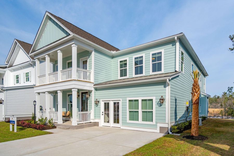 Front exterior of a new home in Cherrywood Estates, Summerville, SC, highlighting curb appeal (Image 2). Front exterior of a new home in Cherrywood Estates, Summerville, SC, highlighting curb appeal (Image 2).