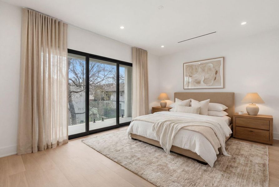 Quaker Aluminum sliding doors to sizable balcony in Primary Suite. *virtually staged