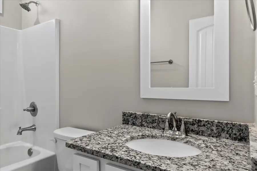 Representative interior finishes for a home built from the Cherokee by Enchanted Homes in Lonesome Dove, San Antonio (Image 30).