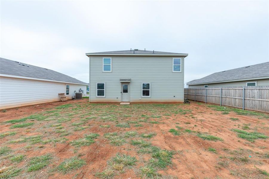 Exterior details and patio area of a home in Waterside at Cedar Creek, Abilene (Image 23).