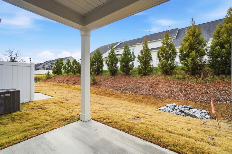 Exterior details and patio area of a home in Harrisburg Village Townhomes, Harrisburg (Image 30).
