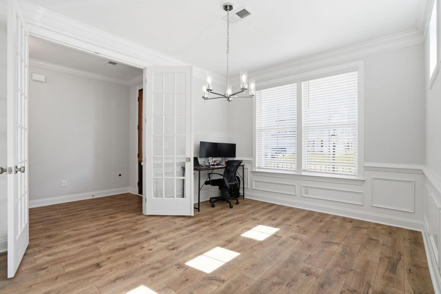 Spacious, unfurnished interior of a new home in Tidewater at Lakes of Cane Bay, Summerville (Image 23).