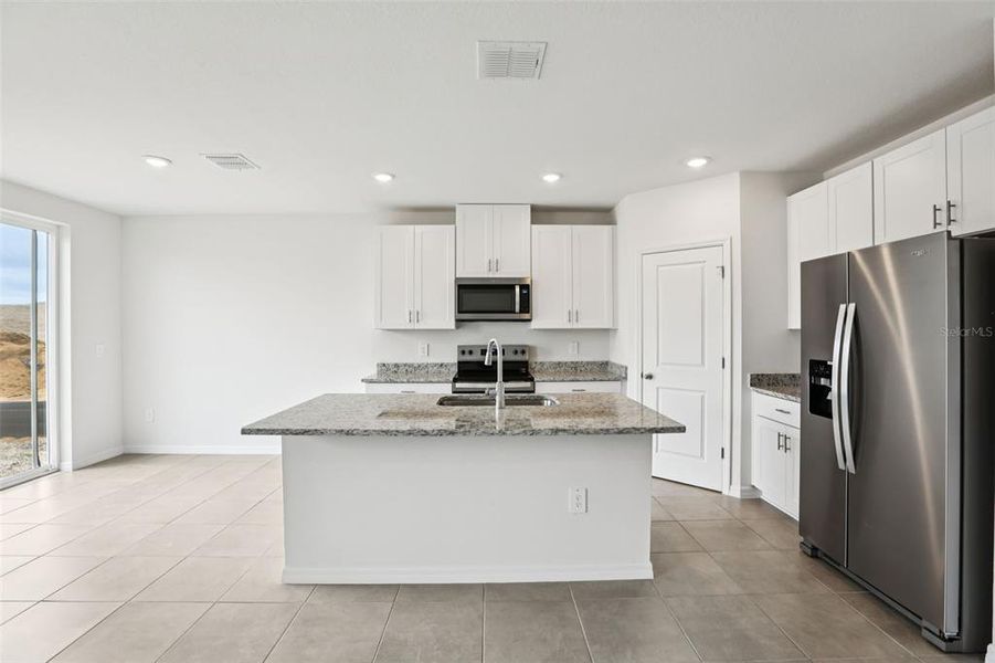 Furnished interior view inside a new home in Benton Hills - Classic Series, Brooksville (Image 8).