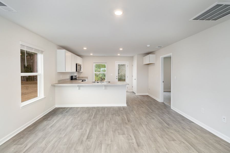 Representative unfurnished interior of a home built from the CURTIS by D.R. Horton in Cottonwood Place, Tabor City (Image 15). Representative unfurnished interior of a home built from the CURTIS by D.R. Horton in Cottonwood Place, Tabor City (Image 15).