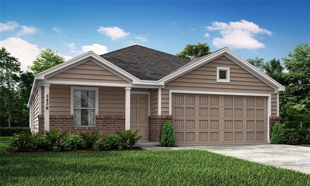 View of front of house featuring a garage and a front yard