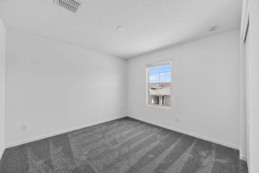 Spacious, unfurnished interior of a new home in Artisan at Asante, Surprise (Image 25).