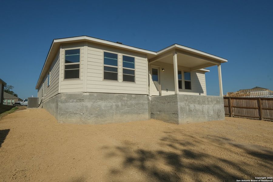 Exterior details and patio area of a home in Cinco Lakes, San Antonio (Image 2). Exterior details and patio area of a home in Cinco Lakes, San Antonio (Image 2).