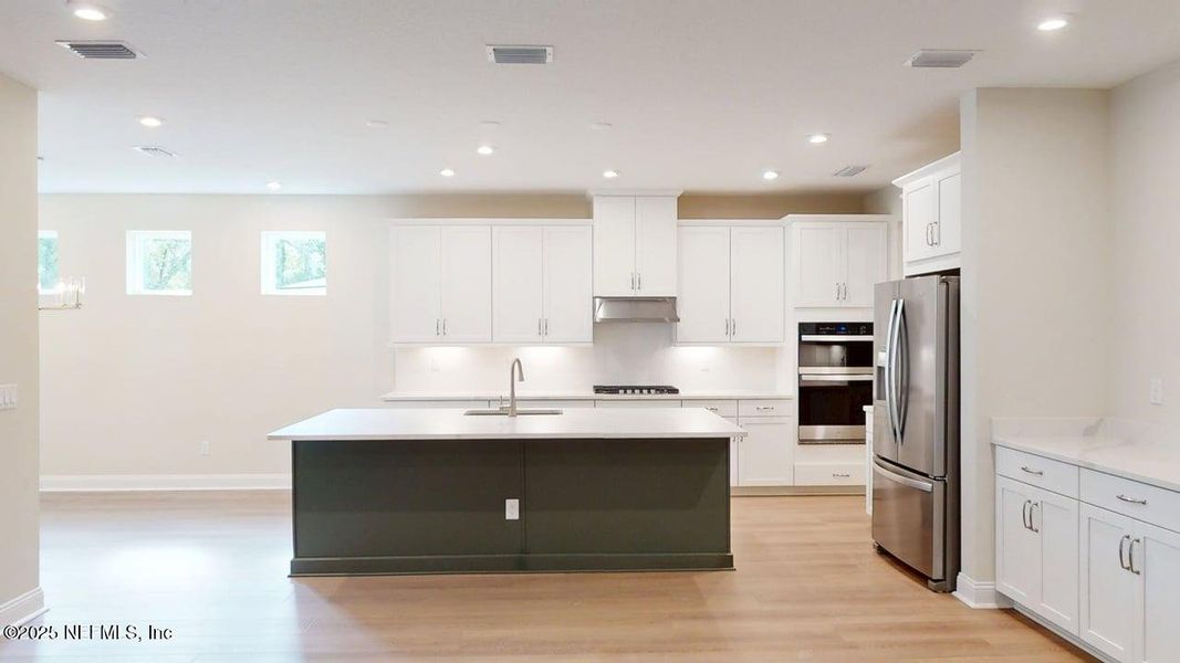 Furnished interior view inside a new home in RiverTown - WaterSong, St. Johns (Image 4).