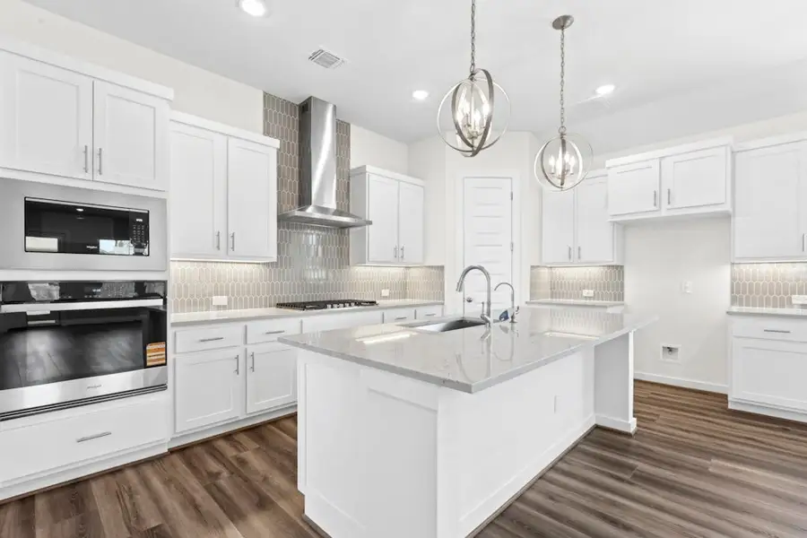 Furnished interior view inside a new home in University Heights, Round Rock (Image 6).