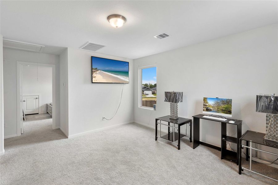 Furnished interior view inside a new home in Sweetgrass Village, Crosby (Image 19).