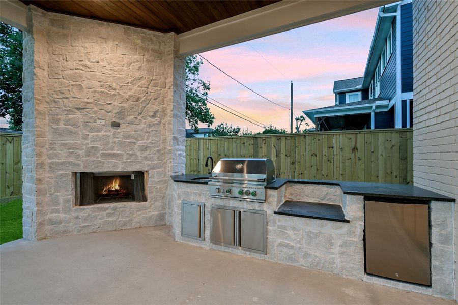 Sample of builder's previous construction. This home will have a similar outdoor veranda layout/outdoor kitchen as pictured here. Buyer still has time to select finishes.