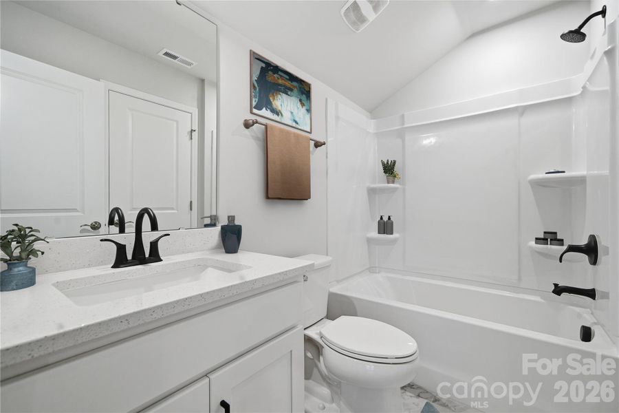 Example Photo Example Photo