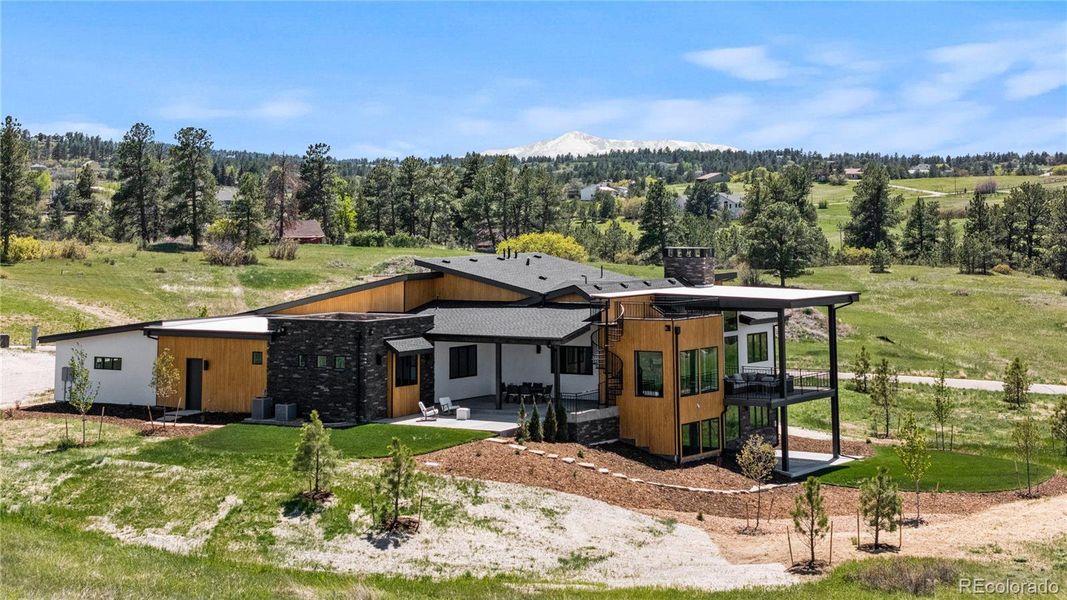 Front exterior of a new home in , Franktown, CO, highlighting curb appeal (Image 17).