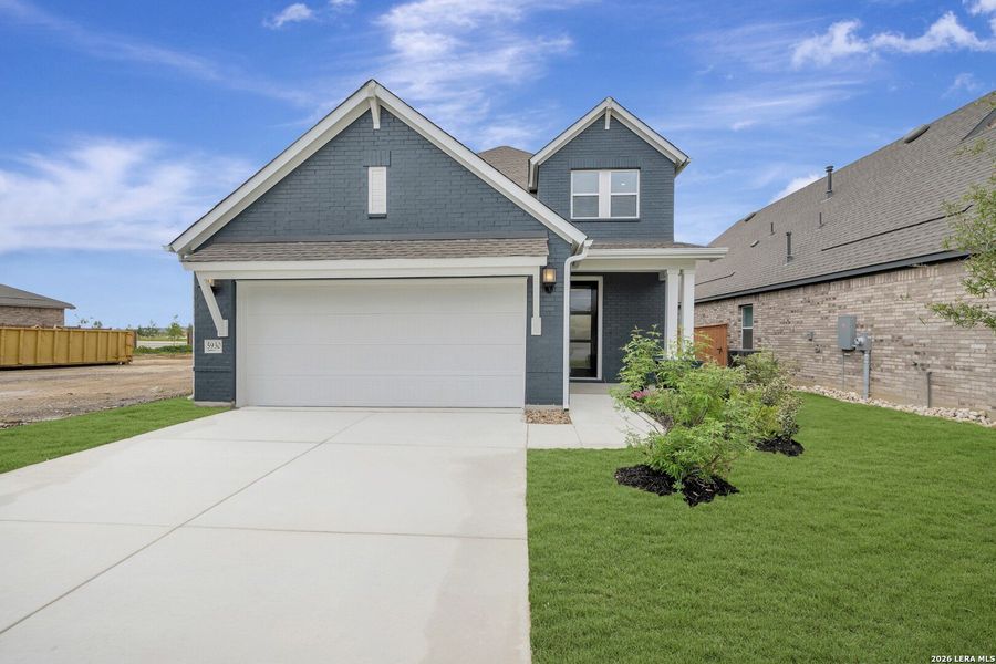 Front exterior of a new home in Mayfair - Select Garden Series, New Braunfels, TX, highlighting curb appeal (Image 1). Front exterior of a new home in Mayfair - Select Garden Series, New Braunfels, TX, highlighting curb appeal (Image 1).