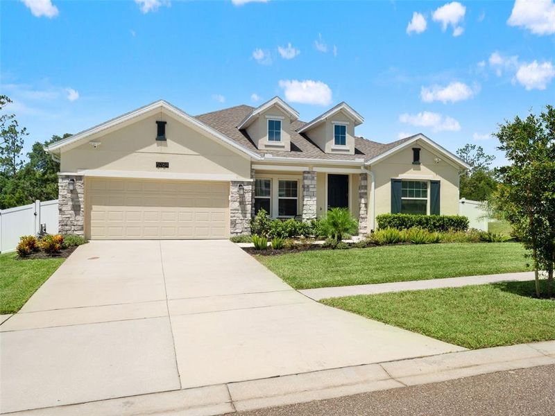 Front exterior of a new home in , Mount Dora, FL, highlighting curb appeal (Image 27). Front exterior of a new home in , Mount Dora, FL, highlighting curb appeal (Image 27).