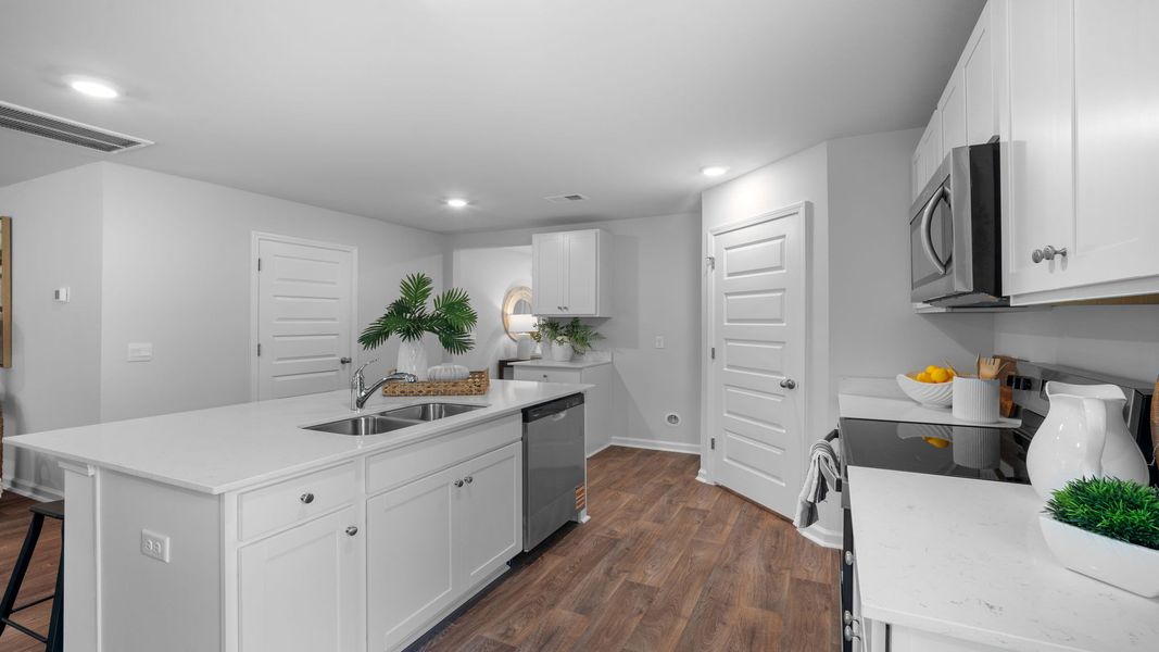 Representative furnished interior of a home built from the Hartsville by D.R. Horton in Rice Hope, Port Wentworth (Image 6).