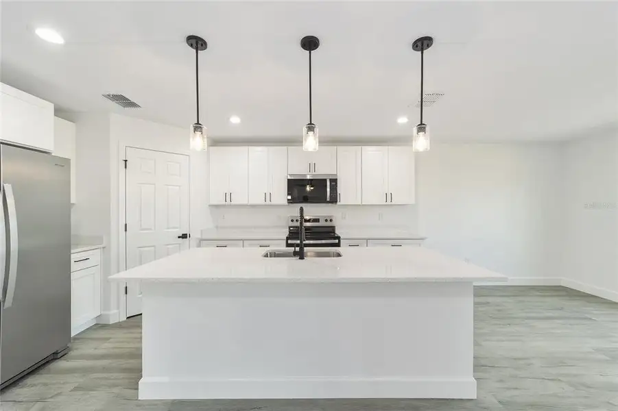 Furnished interior view inside a new home in , Ocala (Image 11).