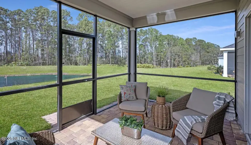 Exterior details and patio area of a home in Edenbrooke at Hyland Trail | 55+: Edenbrooke at Hyland Trail 50s, Green Cove Springs (Image 2). Exterior details and patio area of a home in Edenbrooke at Hyland Trail | 55+: Edenbrooke at Hyland Trail 50s, Green Cove Springs (Image 2).