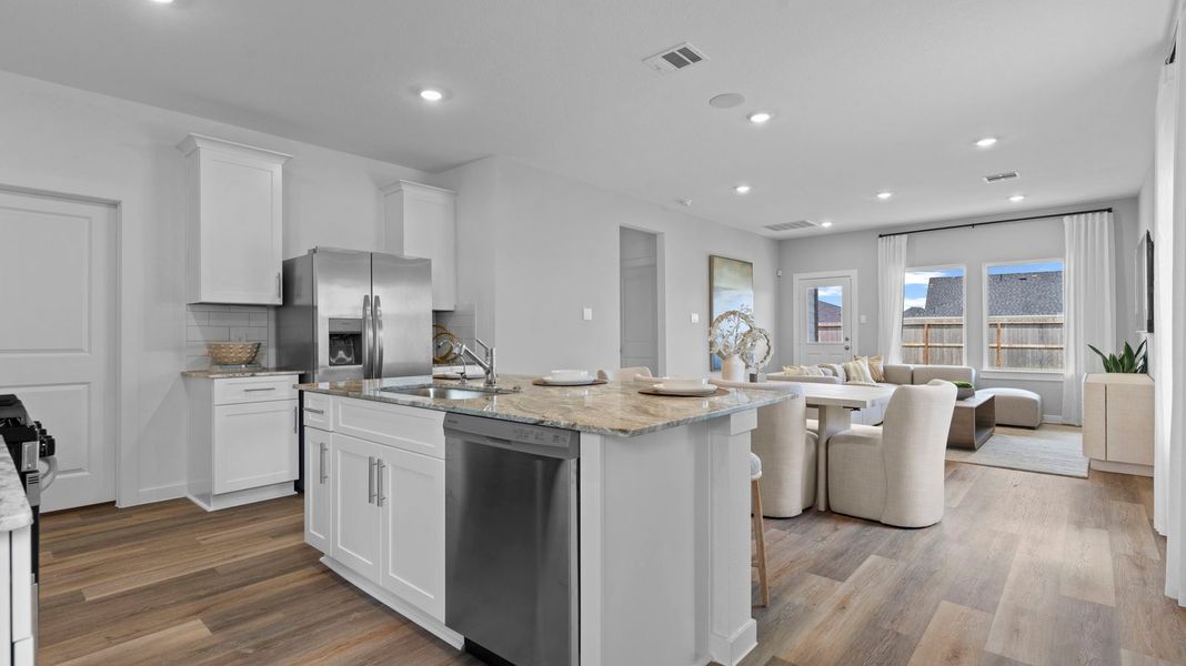 Furnished interior view inside a new home in Caldwell Crossing, Iowa Colony (Image 3).