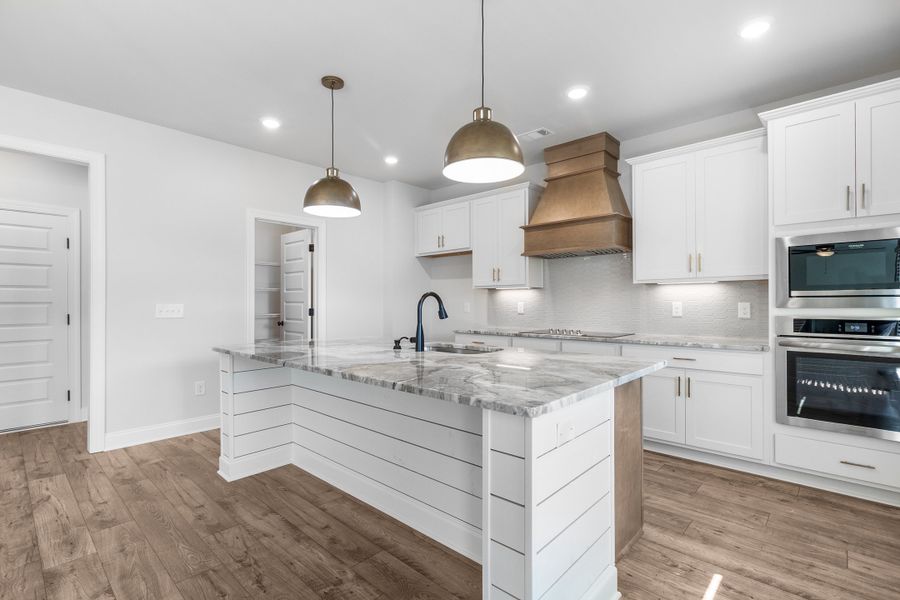 Furnished interior view inside a new home in Ridge Pointe, Athens (Image 5).