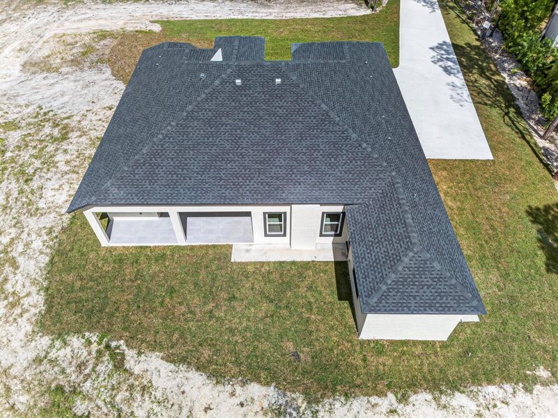 Front exterior of a new home in , The Acreage, FL, highlighting curb appeal (Image 1). Front exterior of a new home in , The Acreage, FL, highlighting curb appeal (Image 1).