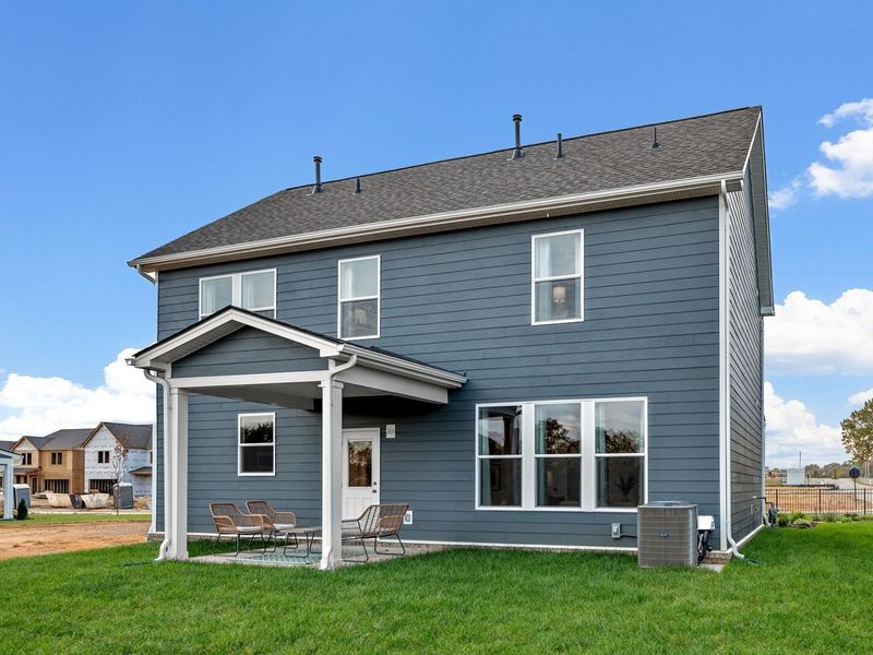 Exterior details and patio area of a home in Sage Farms, White House (Image 24).