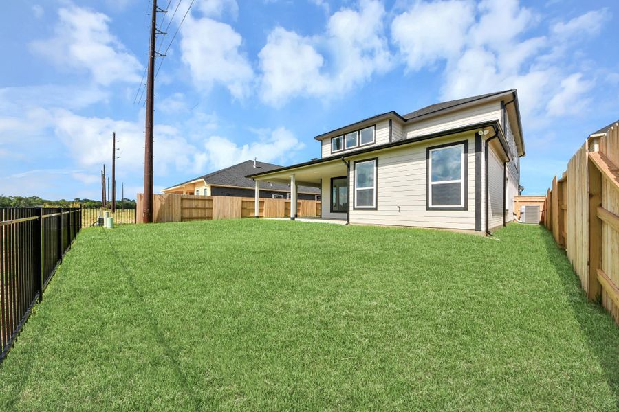 Backyard retreat, offering an abundance of space for kids to play and explore. The possibilities are endless in this outdoor haven, where the joy of open-air activities and family gatherings awaits. Backyard retreat, offering an abundance of space for kids to play and explore. The possibilities are endless in this outdoor haven, where the joy of open-air activities and family gatherings awaits.