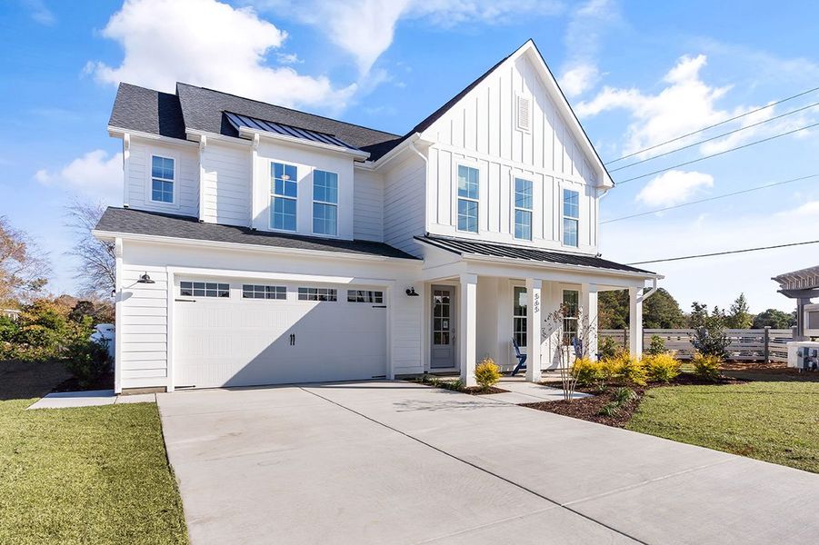 Representative exterior photo of a completed home built from the The Hampton by RobuckHomes in Windwater, Hampstead, NC (Image 28).
