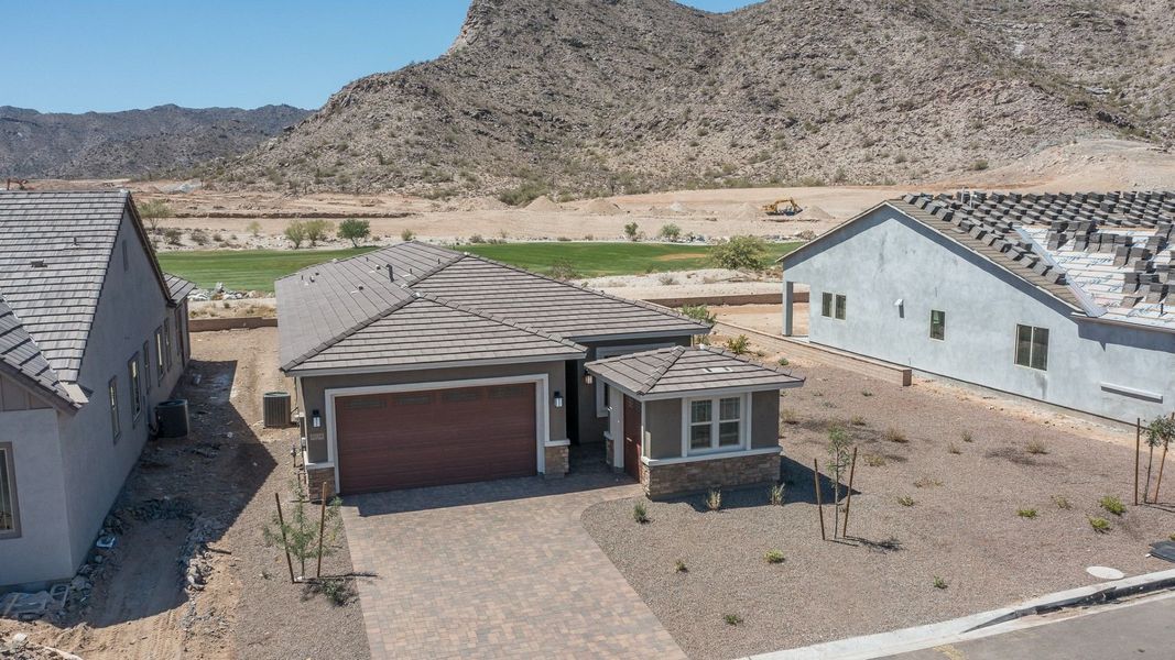 Representative exterior photo of a completed home built from the Sawgrass II by William Ryan Homes in Fairways in Victory at Verrado, Buckeye, AZ (Image 19).
