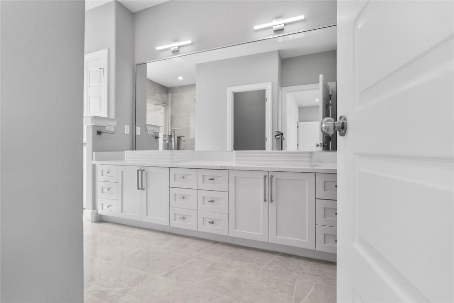 Primary bath with double sinks Primary bath with double sinks