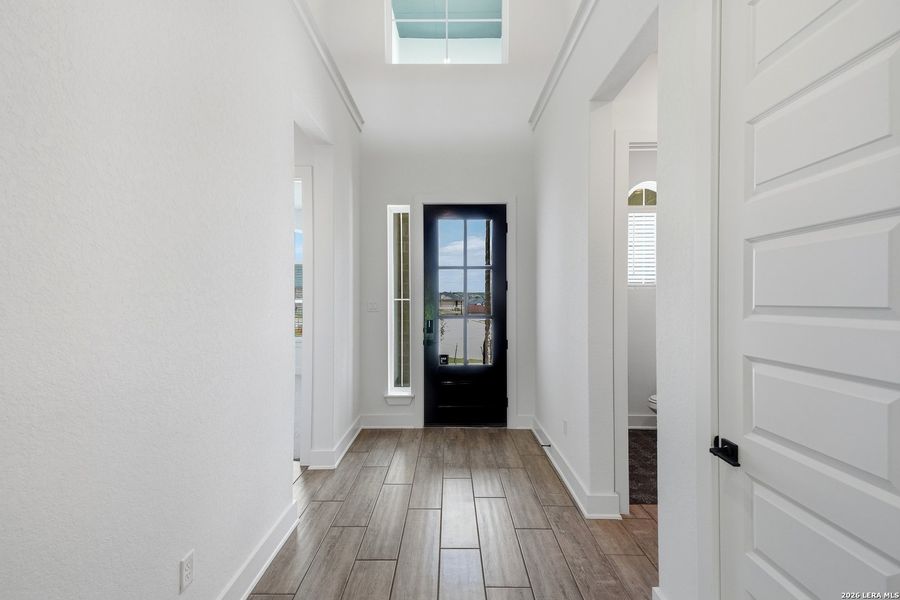 Spacious, unfurnished interior of a new home in The Reserve at Potranco Oaks, Castroville (Image 24).