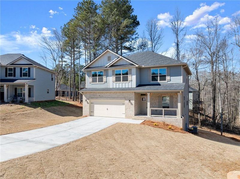 Front exterior of a new home in Magnolia Villas, Cornelia, GA, highlighting curb appeal (Image 26).