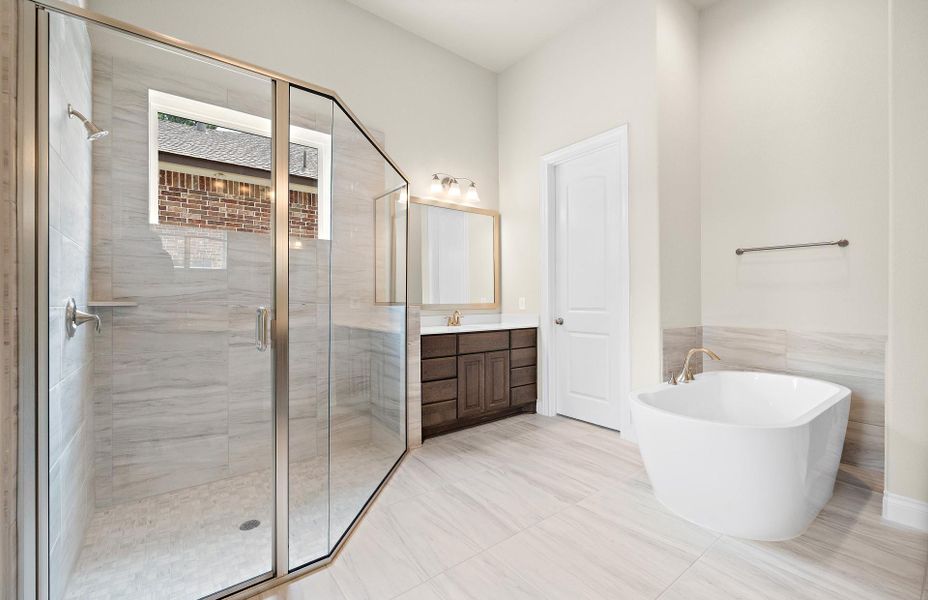 Furnished interior view inside a new home in The Woodlands Hills 65′, Willis (Image 19).