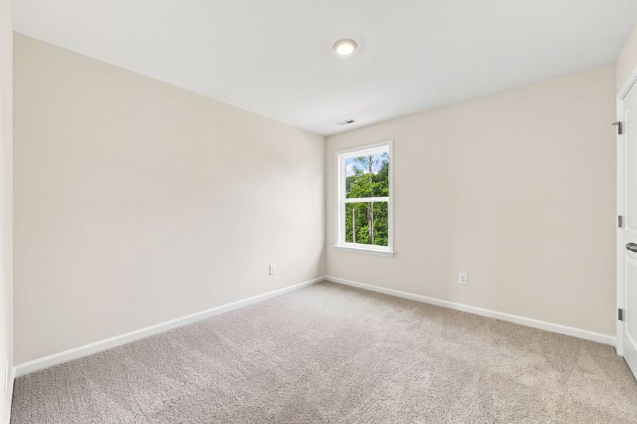 Spacious, unfurnished interior of a new home in Neill's Pointe, Angier (Image 26).