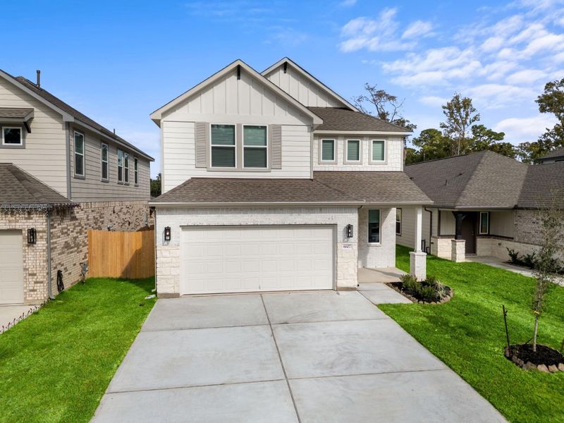 Front exterior of a new home in Cypresswood Landing, Humble, TX, highlighting curb appeal (Image 2). Front exterior of a new home in Cypresswood Landing, Humble, TX, highlighting curb appeal (Image 2).